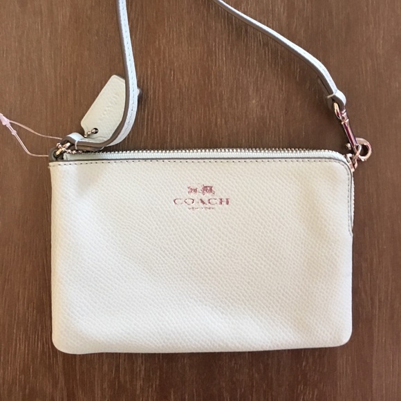 Coach Handbags - Seafoam Green Leather Coach Wristlet